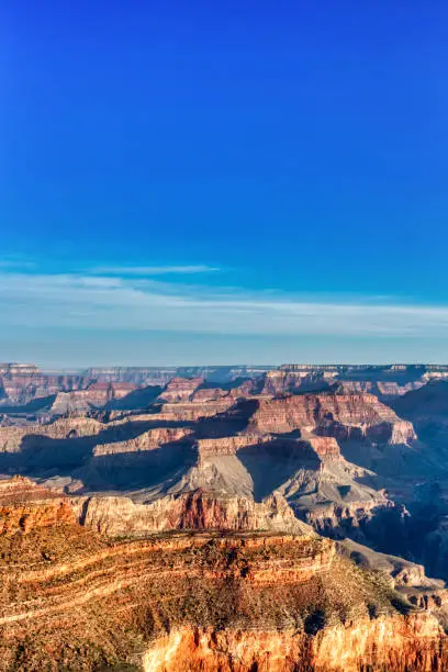 Photo of Grand Canyon View from South Rim with Bright Blue Sky at Sunset