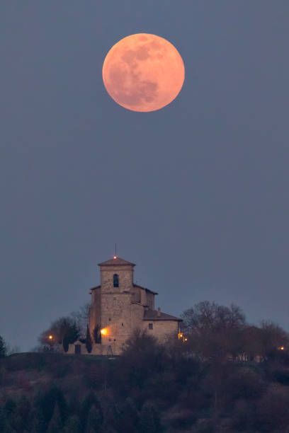 istock Full moon over Estarrona church in Alava, Spain 1132348817