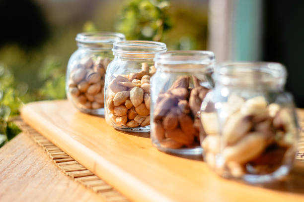 Nuts in the glass jar. The concept of vegetarian and organic food