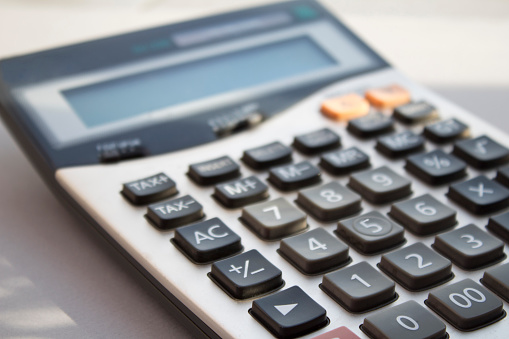 Close up button calculator , calculator on table