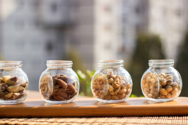 Nuts in the glass jar. The concept of vegetarian and organic food