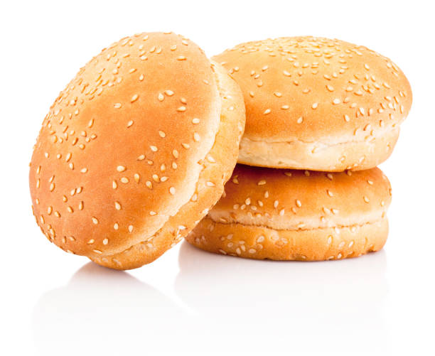 istock Three hamburger buns with sesame isolated on a white background 1132350028