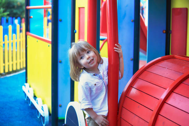 istock Child playing in modern playground 1132350031