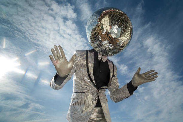 mr discoball outside mr discoball. a super cool disco club character enjoying some summer sunshine burlesque stock pictures, royalty-free photos & images