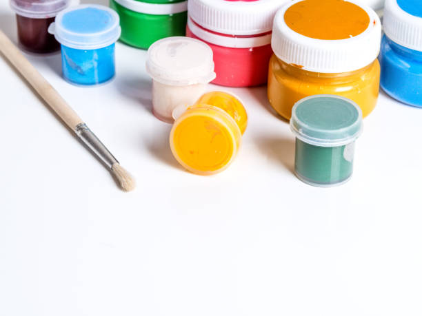 istock Colorful vibrant cans of gouache. on a white background 1132354400