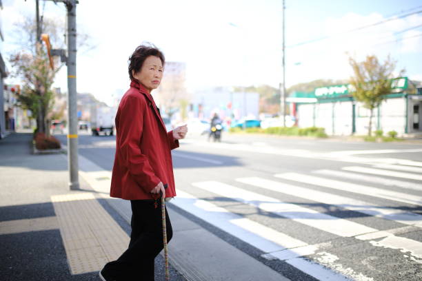 istock Senior woman crossing 1132356449