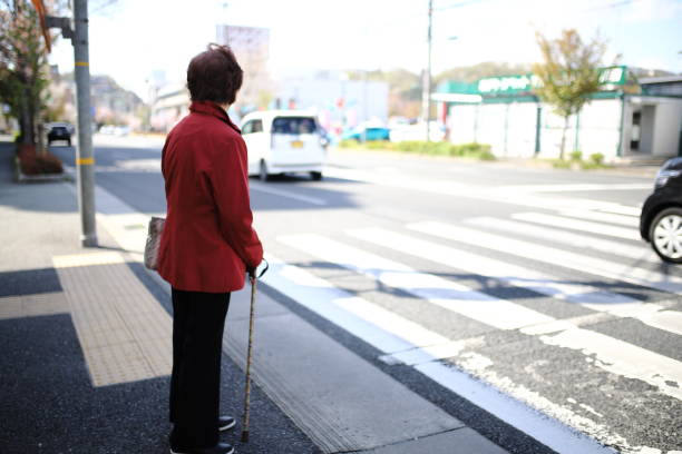 istock Senior woman crossing 1132356451