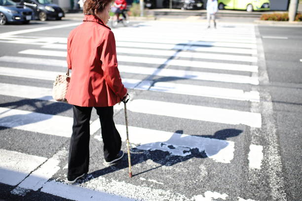 istock Senior woman crossing 1132356456