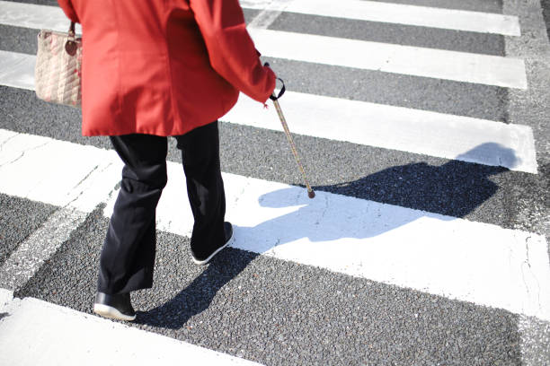 istock Senior woman crossing 1132356458