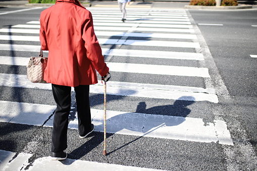 Senior woman crossing