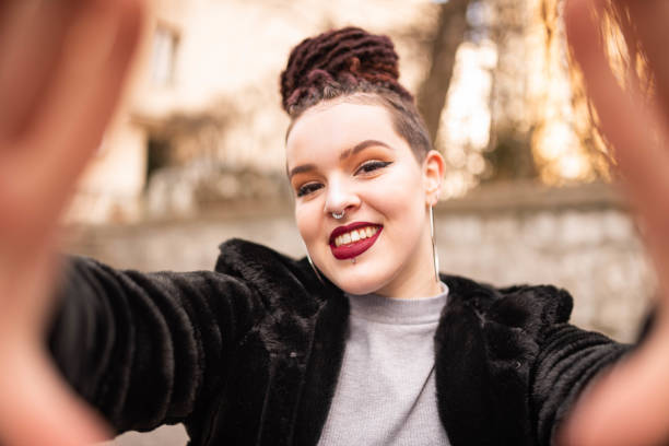 istock Hipster girl taking a selfie 1132357288