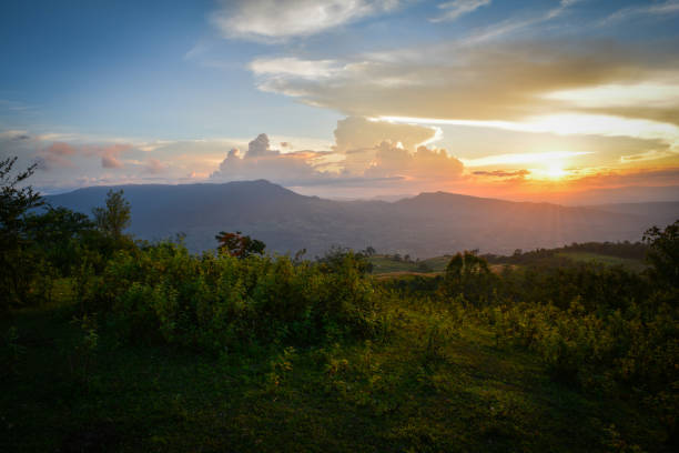 istock beautiful clouds Sunset dramatic colorful of yellow and blue sky 1132360219