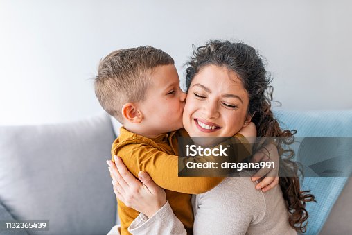istock Son is kissing his mother. 1132365439