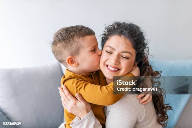 Son Is Kissing His Mother Stock Photo - Download Image Now - Mother, Child, Family