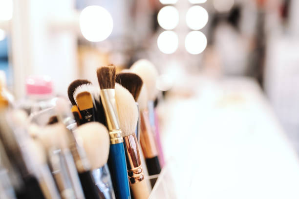 istock Close up of makeup brushes on desk. Selective focus on brushes. 1132372636