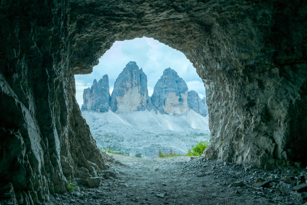 istock Tre Cime - Three Peaks seen from the rocky cave 1132373164