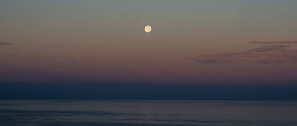 istock spectacular view from a great moon over the sea 1132377397