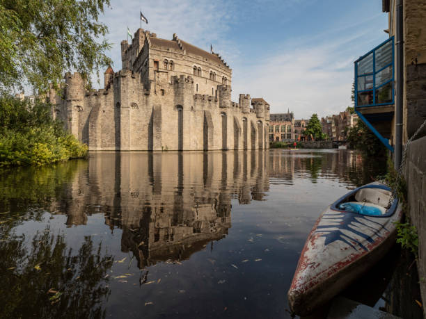 The Gravensteen as seen from the water in Ghent, Belgium.