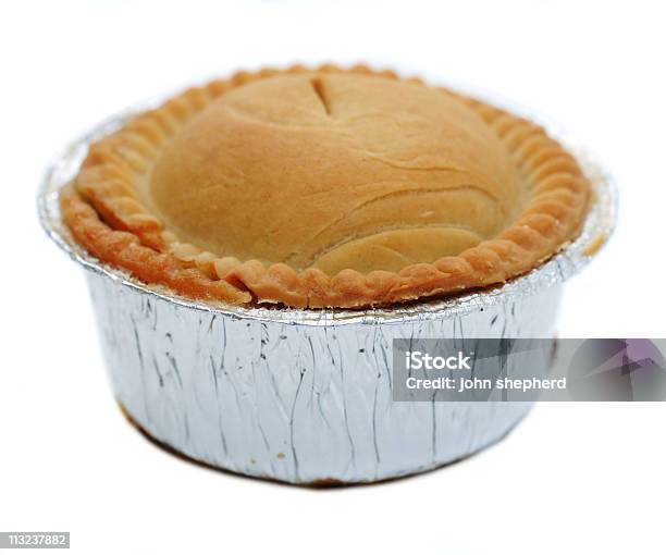 Meat Pie In Foil Wrapper Against White Stock Photo - Download Image Now - Color Image, Cut Out, Food