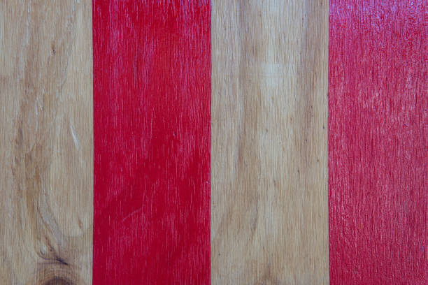 istock red painted stripes on wooden surface 1132380320