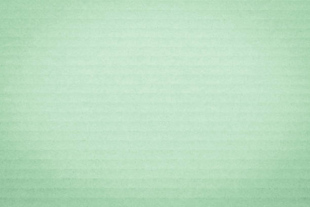 istock Recycled cardboard textured pattern grunge detailed backdrop in pastel green color 1132381951