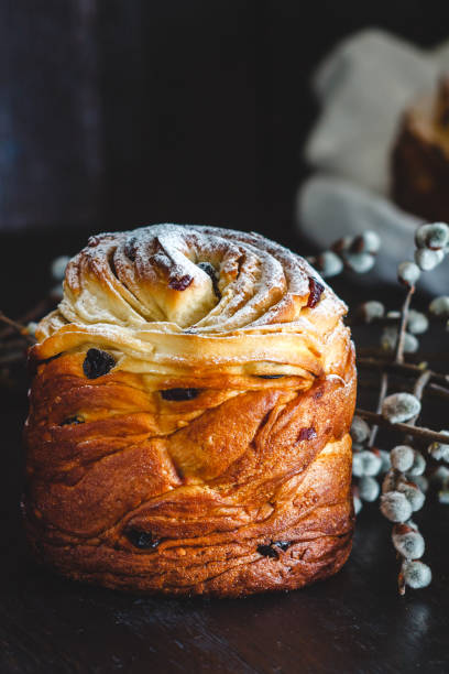 istock Easter cake kranch with icing sugar on a dark background and with willow flowers 1132382277
