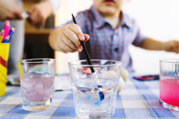 istock Little boy Painting Water Colors 1132382546