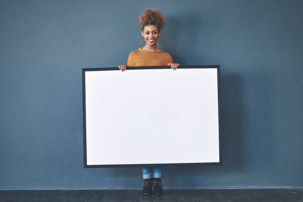 i'll hold your message for the world to see - placard women holding standing imagens e fotografias de stock