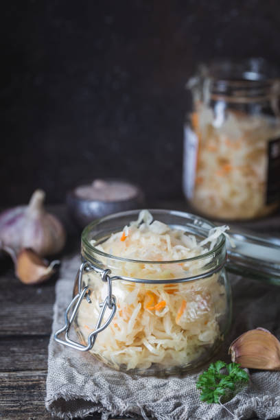 istock Glass jar with homemade sauerkraut 1132383761