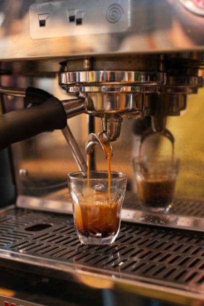istock espresso machine pouring espresso, barista on work, cafe scene, making espresso 1132384806