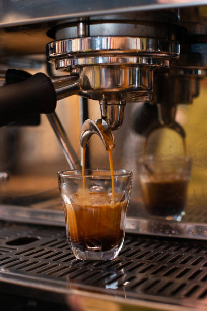 istock espresso machine pouring espresso, barista on work, cafe scene, making espresso 1132385065