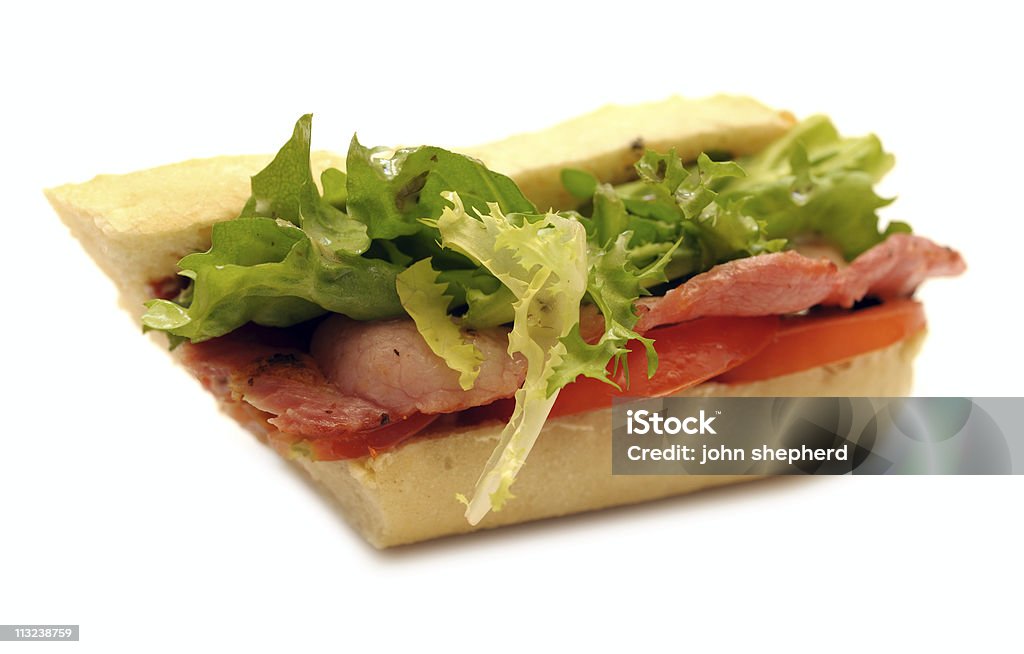 B L T baguete contra branco - Foto de stock de Bacon Alface e Tomate royalty-free