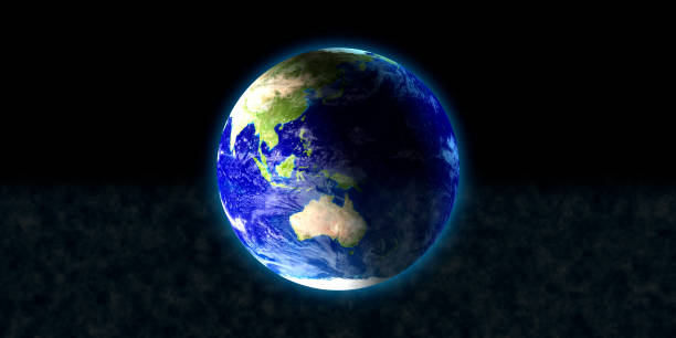 istock The blue planet earth with beautiful outer glow and lens flare ring in dark background. Elements of this image furnished by NASA. 1132391992