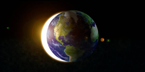 istock The blue planet earth with beautiful outer glow and lens flare ring in dark background. Elements of this image furnished by NASA. 1132391998