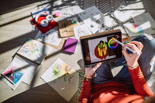 Hardworking Young Woman, Artist Painting And Making Illustrations at Home