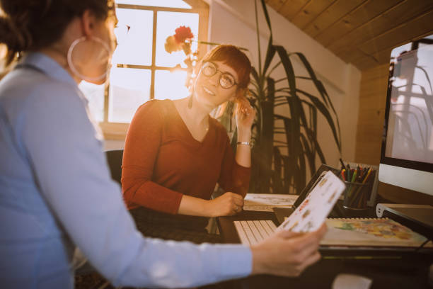 istock Design Professional Coworkers Working Together And Chatting Happily 1132392171