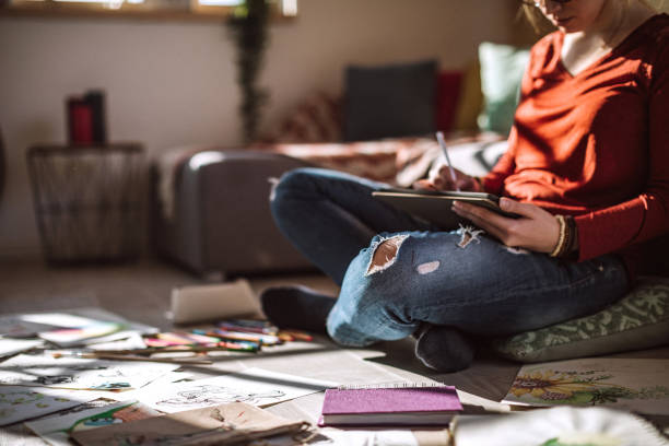 istock Creative Young Woman Making Art at Home 1132392813