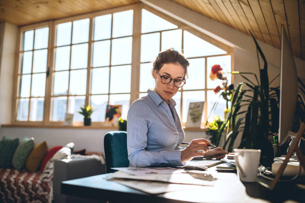 Businesswoman Getting Her Work Done at Office