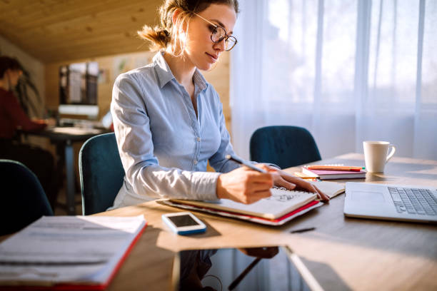istock Business Woman Working at Office, Dealing With Paperwork 1132392867