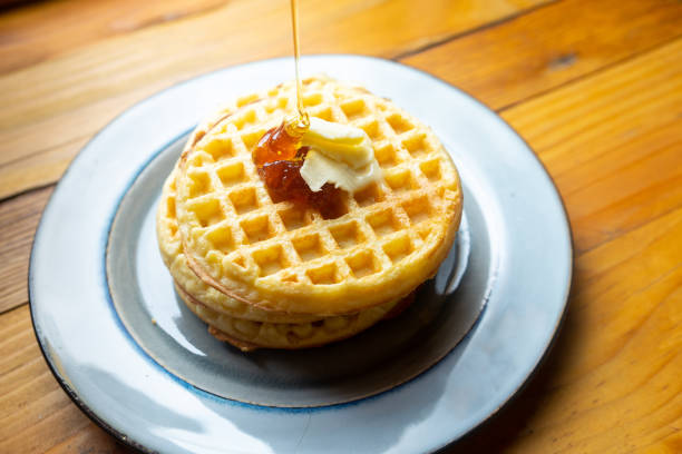 istock Classic waffles with butter and honey 1132393132