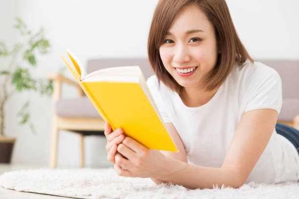 istock woman who reads a book 1132393149