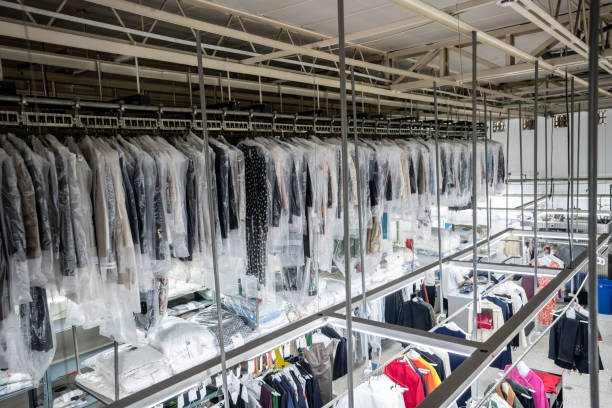 View of an industrial laundry service with no people View of an industrial laundry service with no people - Business industry concepts dry cleaner stock pictures, royalty-free photos & images