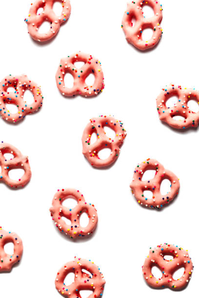 istock Strawberry flavoured yogurt covered pretzels on white background 1132397051