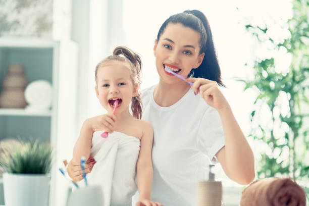 istock family are brushing teeth 1132402242