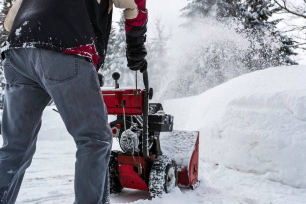 istock Senior Man Using SnowBlower After a Snowstorm 1132412774