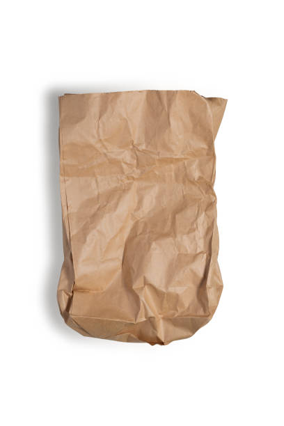 brown paper bag used with clipping path . - papel de pão imagens e fotografias de stock