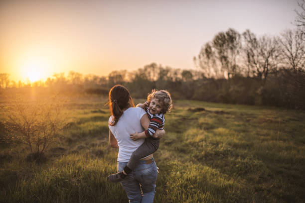 istock Mother and son having fun outdoors 1132417235