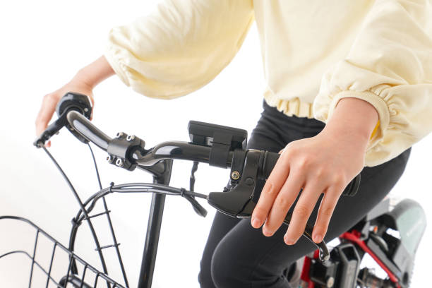 istock Young woman riding bike 1132420216