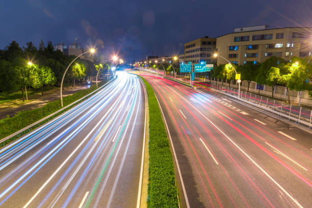 istock The cars on the highway light trails 1132422484