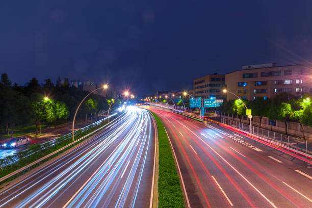 istock The cars on the highway light trails 1132422629